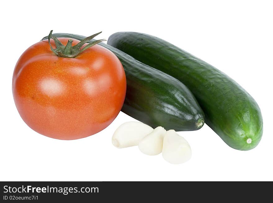 Tomato, cucumber and garlic vegetables on white background