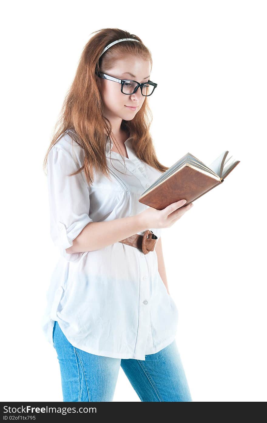 Redhaired businesswoman with notepad .