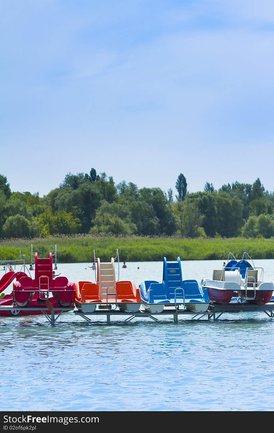 Paddle boats at the beach of lake Balaton. Paddle boats at the beach of lake Balaton