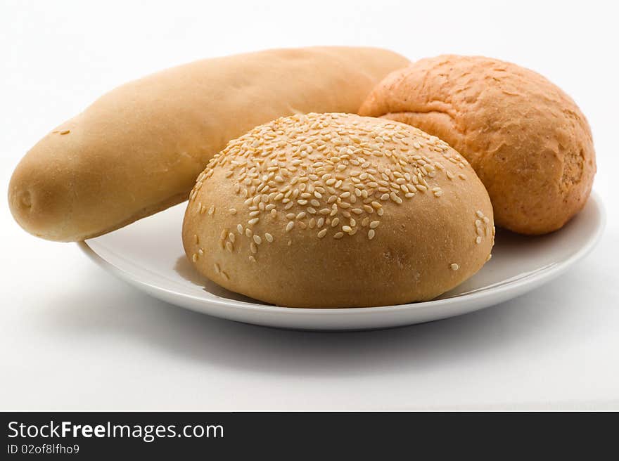 Wheat bread on the white plate