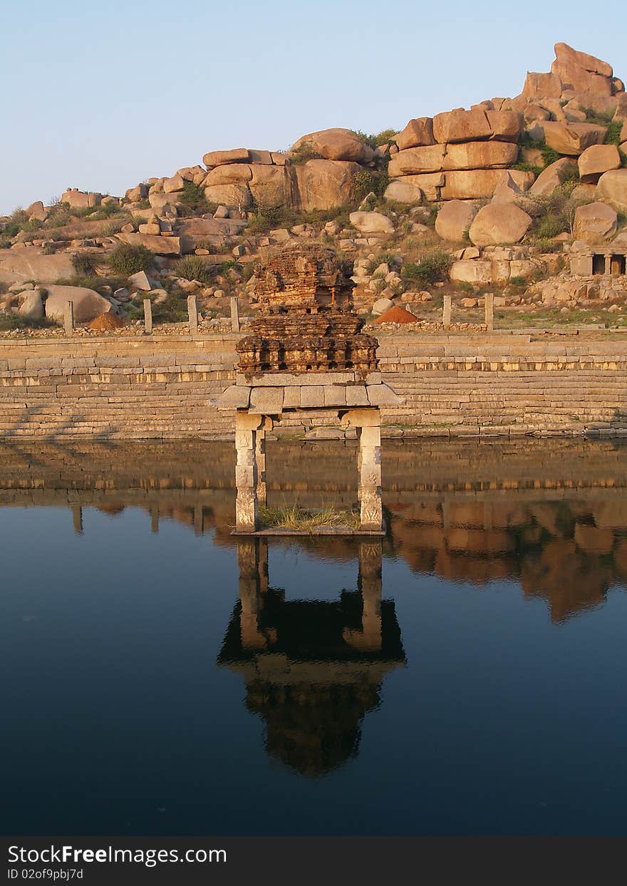 Reflection of the ruin temple Photo take n on December 2008 in Hampi, India Hampi is a village in northern Karnataka state, India. It is located within the ruins of Vijayanagara, the former capital of the Vijayanagara Empire.