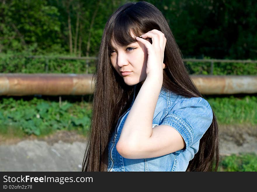 Girl walking in city  park. Girl walking in city  park