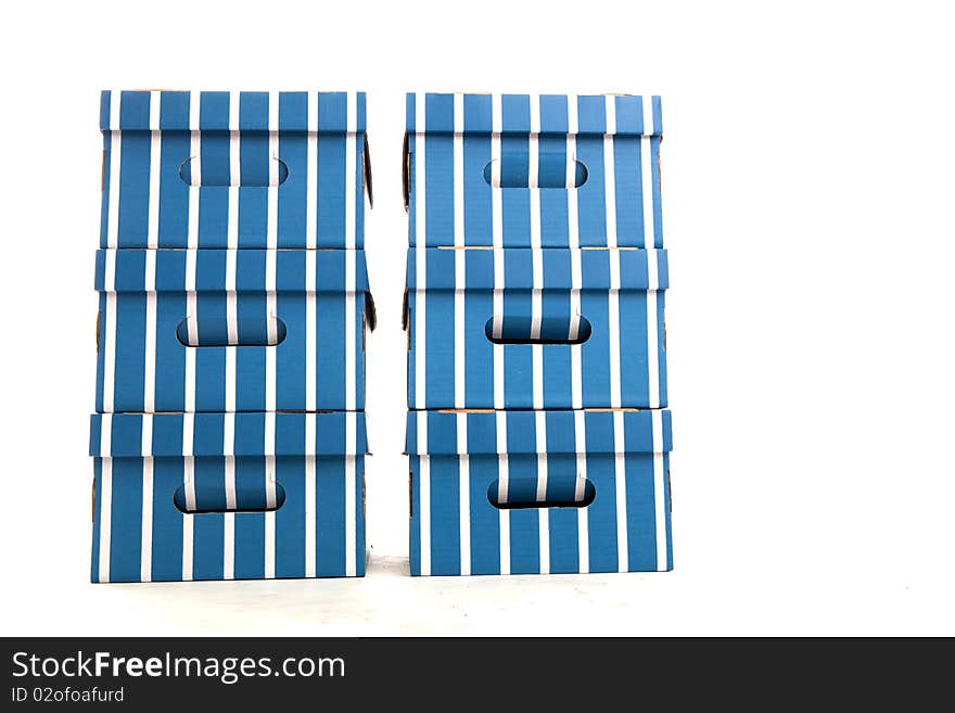 Two Piles of Colourful Cardboard Boxes on White Isolated Background. Two Piles of Colourful Cardboard Boxes on White Isolated Background