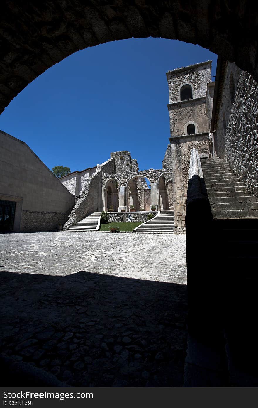 Ancient arch in church, each one town doors. Ancient arch in church, each one town doors