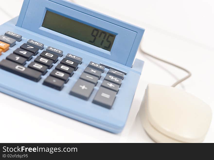 Calculator with California tax displayed and mouse for online financing. Calculator with California tax displayed and mouse for online financing