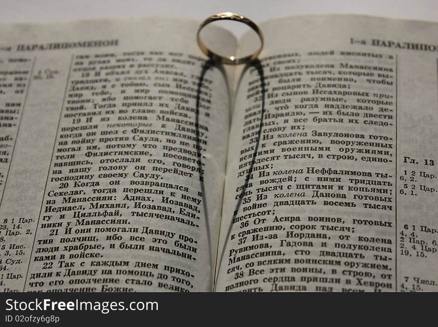 Wedding ring on a Bible. Wedding ring on a Bible