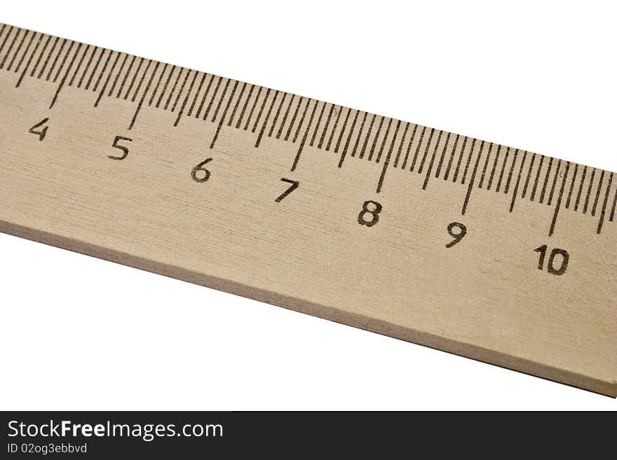 Old wooden ruler isolated on the white background