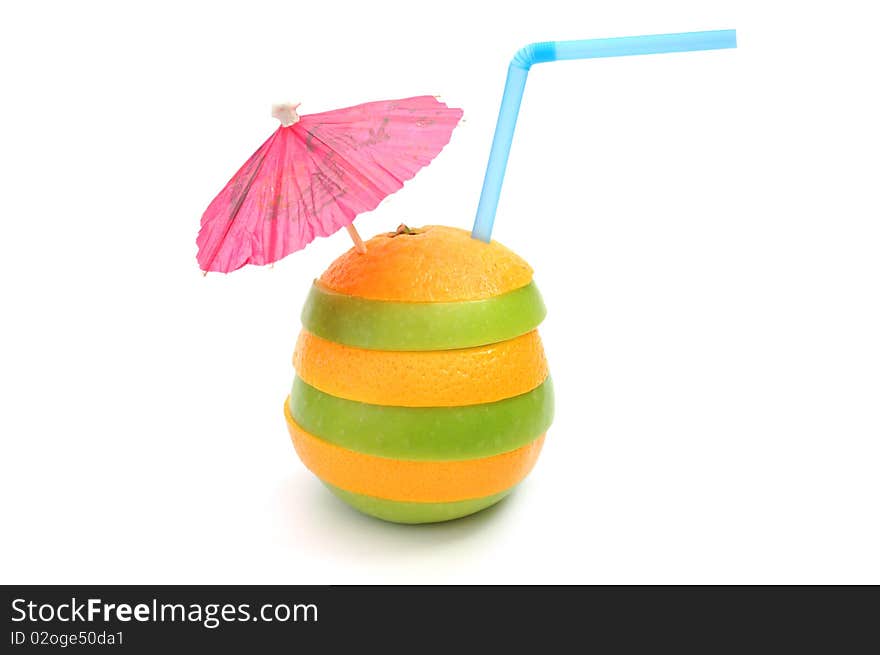 Fruit slice cocktail with a party umbrella and straw. Fruit slice cocktail with a party umbrella and straw