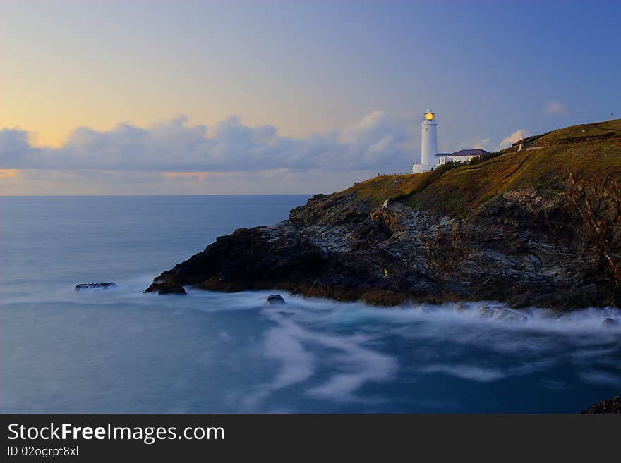 Lighthouse in cornwall england on cliffs. Lighthouse in cornwall england on cliffs