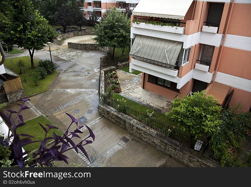 New homes in a building with a green garden