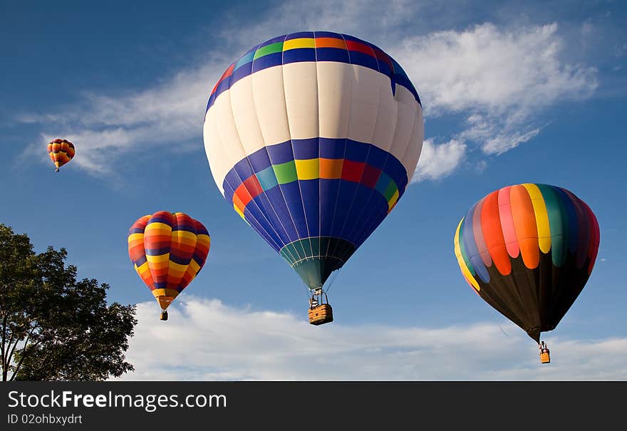 Hot air balloons ascending above the Colorado Springs Balloon Classic. Hot air balloons ascending above the Colorado Springs Balloon Classic