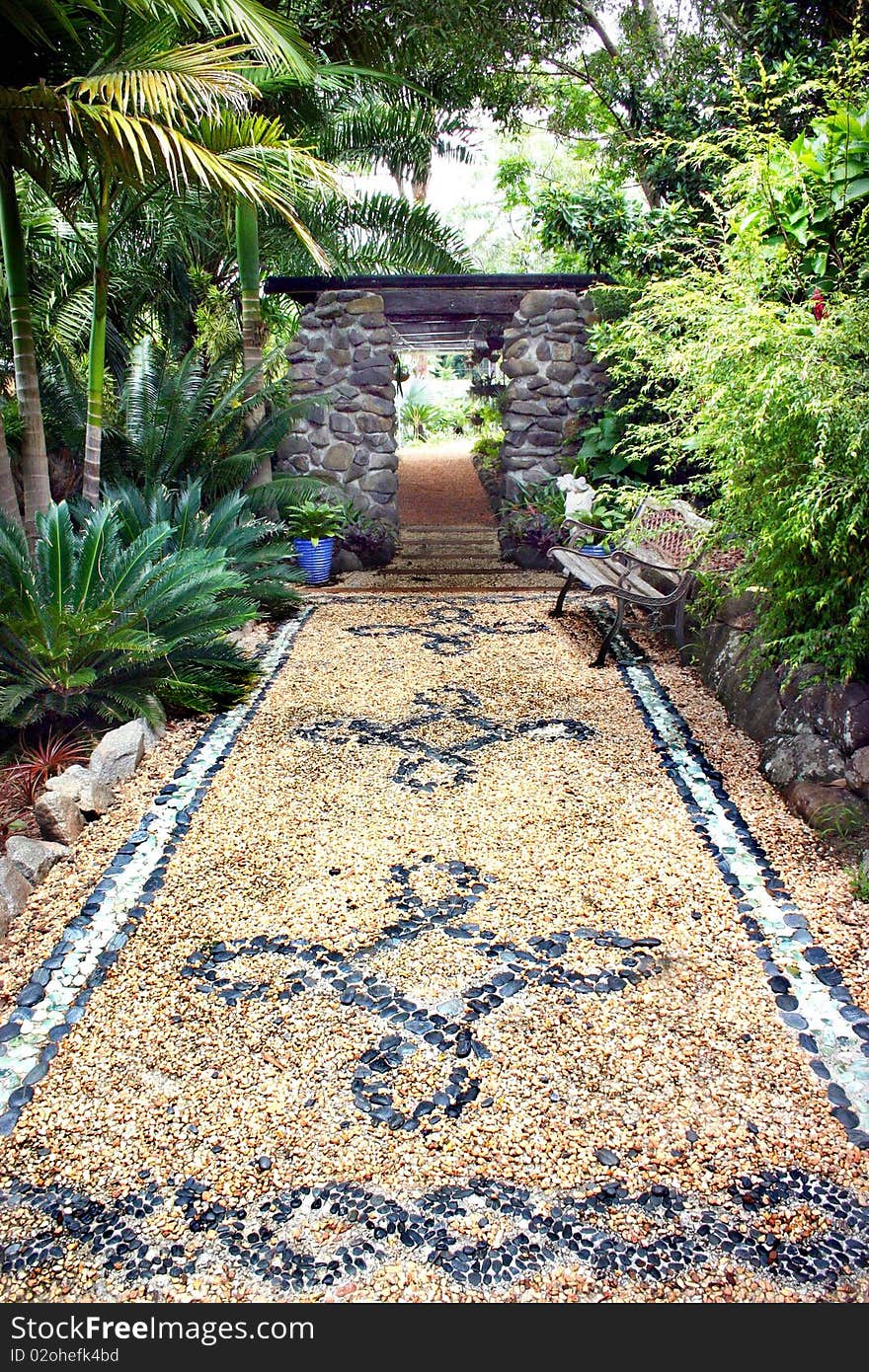 Patterned garden path with stone inlay. Patterned garden path with stone inlay