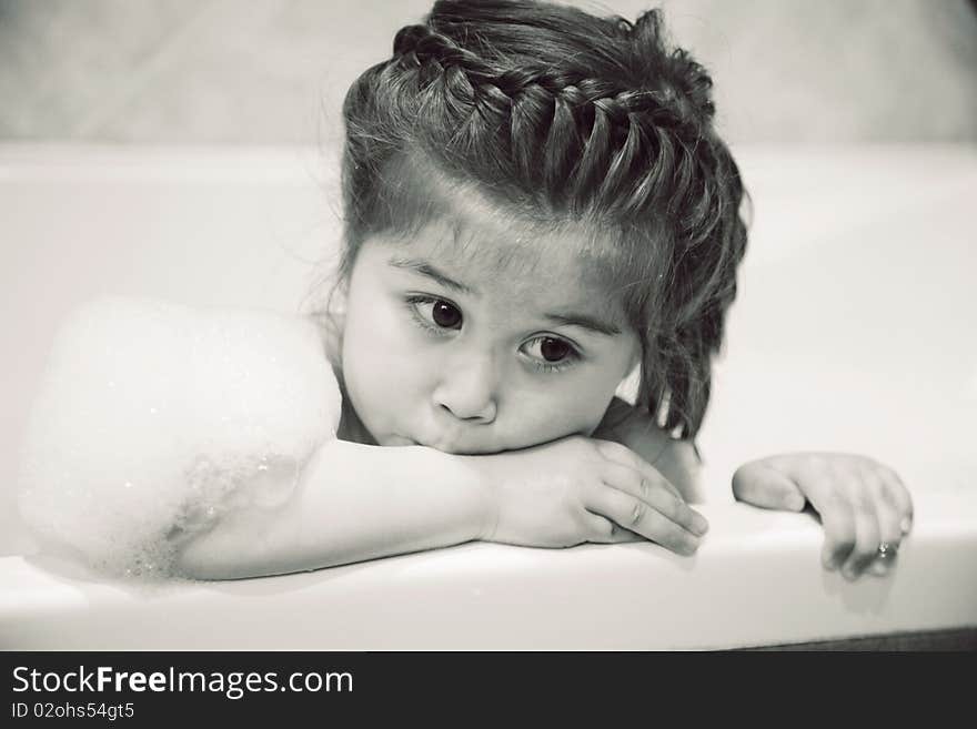 Girl taking bath with bath foam (b&w). Girl taking bath with bath foam (b&w)