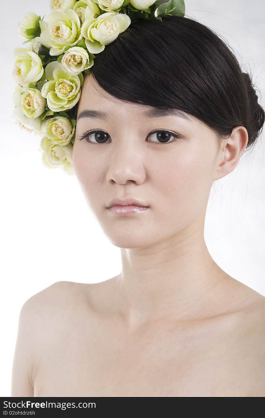 Beautiful bride with perfect natural makeup,flowers on head