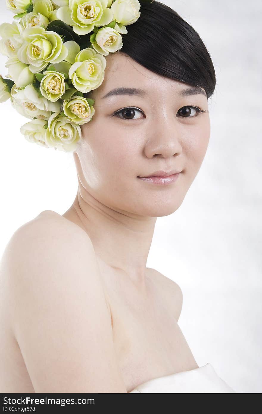 Beautiful bride with perfect natural makeup,flowers on head,smiling