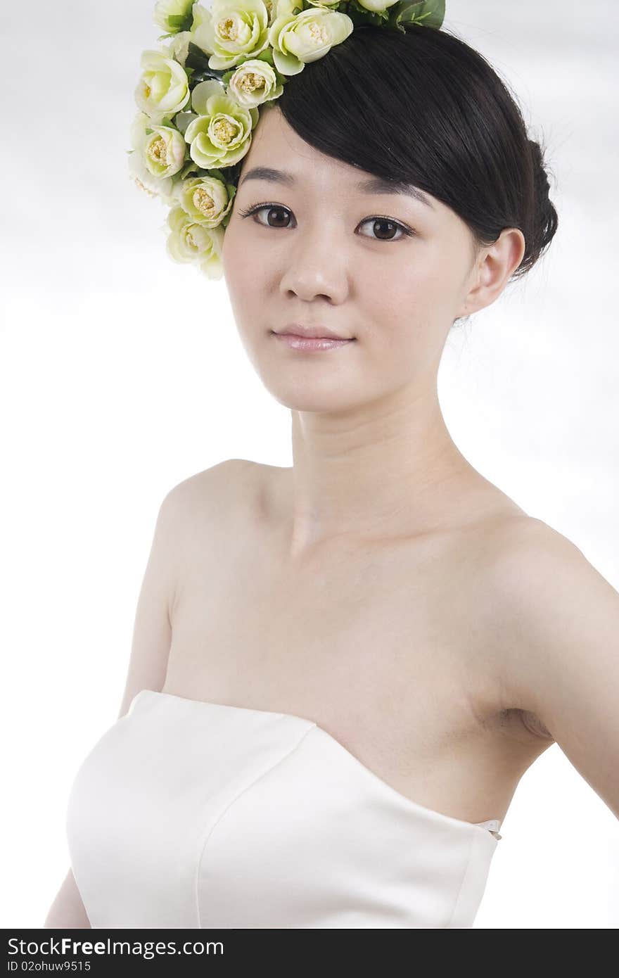 Beautiful bride with perfect natural makeup,flowers on head,smiling