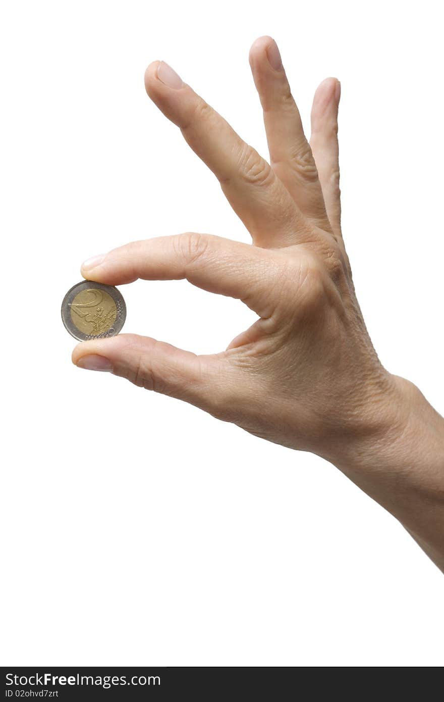 One hand holding a coin