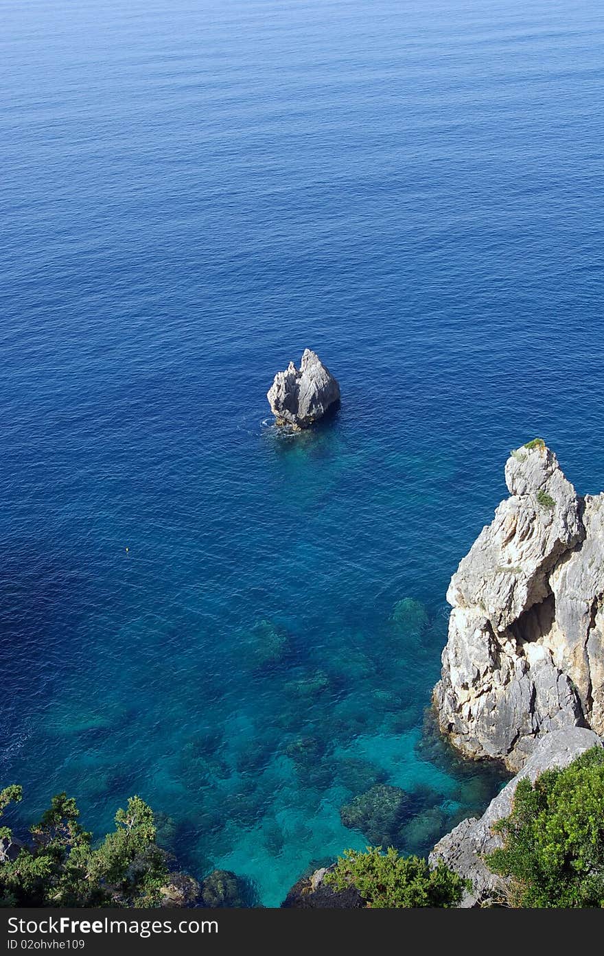 Rock in clear water.