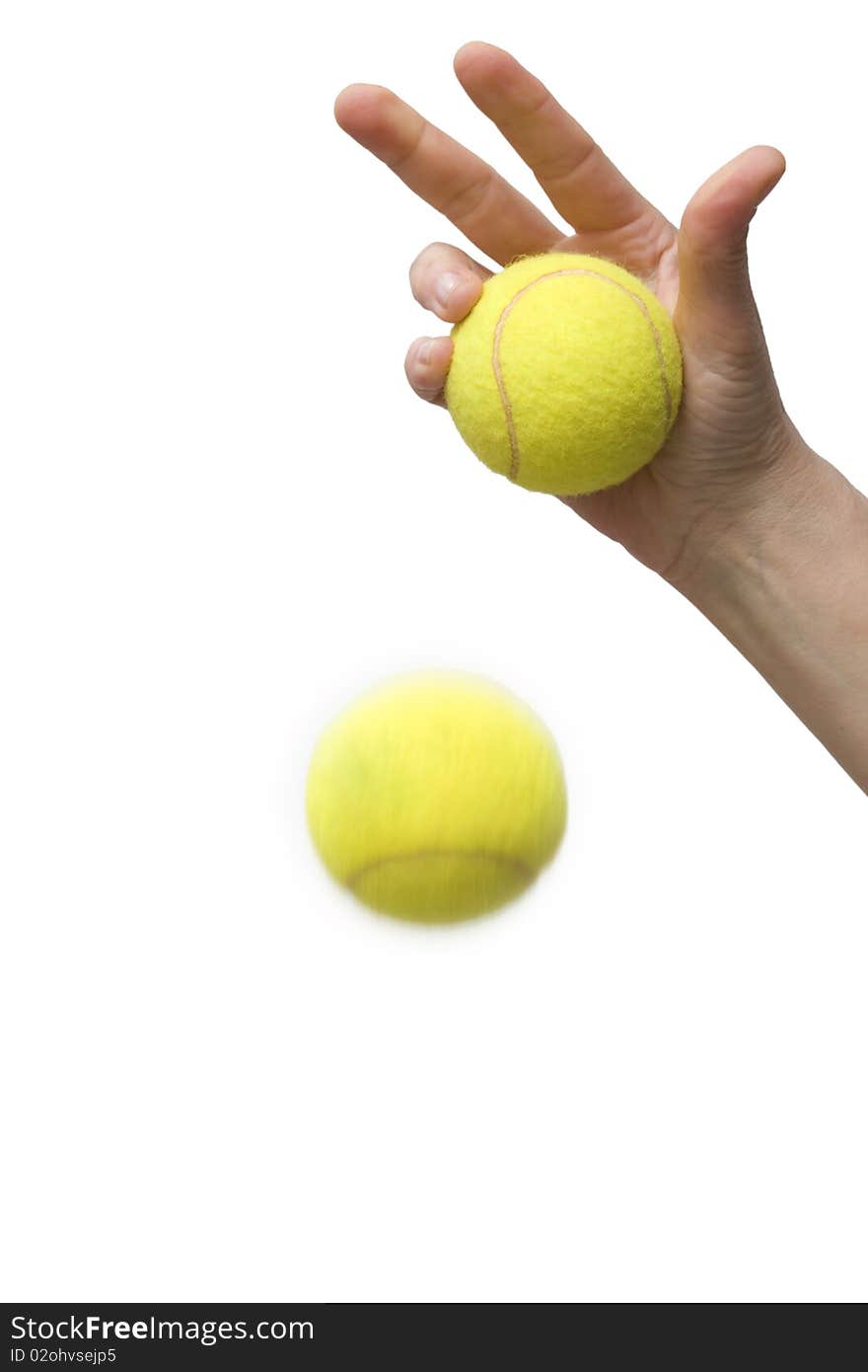 Hand holding tennis balls