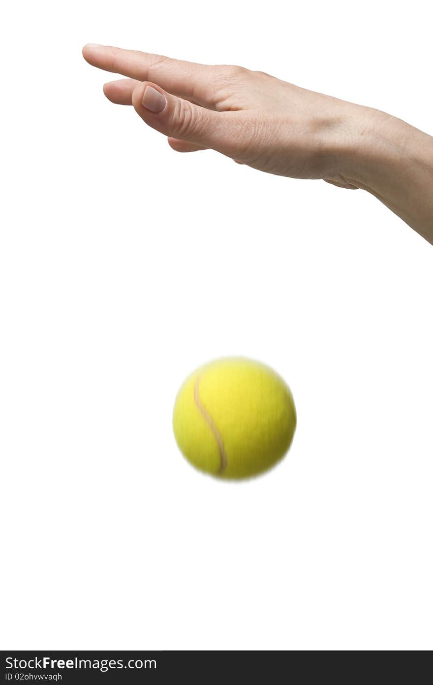 Hand playing with tennis balls