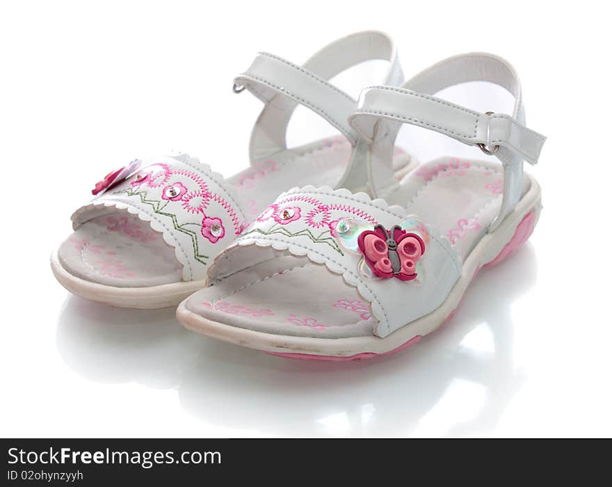 Children's barefoot persons, on a white background, it is isolated. Children's barefoot persons, on a white background, it is isolated.