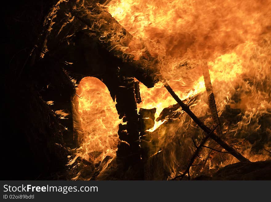 Closeup of the blazing fire and burning kennel. Closeup of the blazing fire and burning kennel.