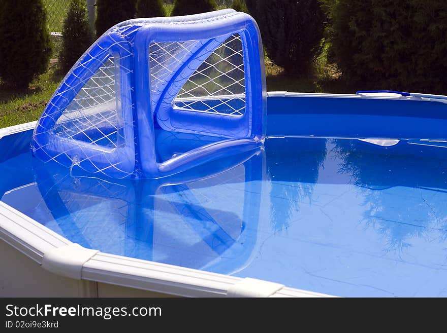 Garden pool with water polo goal.