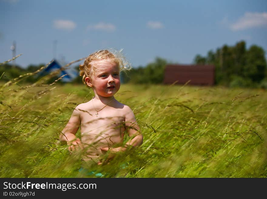 Little Girl In The Field Of Countryside