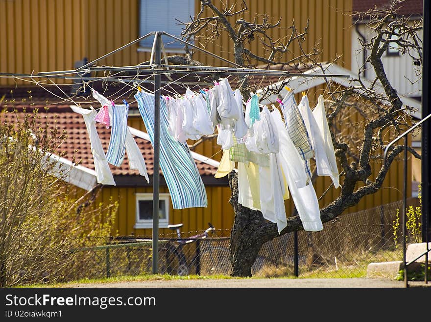 The linen after washing dries in a court yard. Taken near Oslo, Norway. The linen after washing dries in a court yard. Taken near Oslo, Norway.