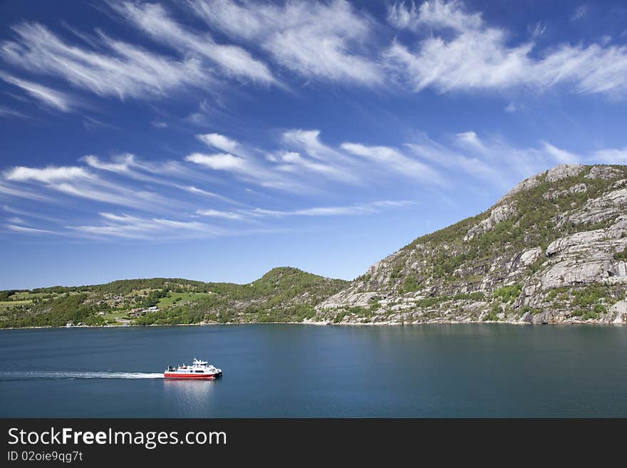 Ship go through the fjord. Ship go through the fjord.