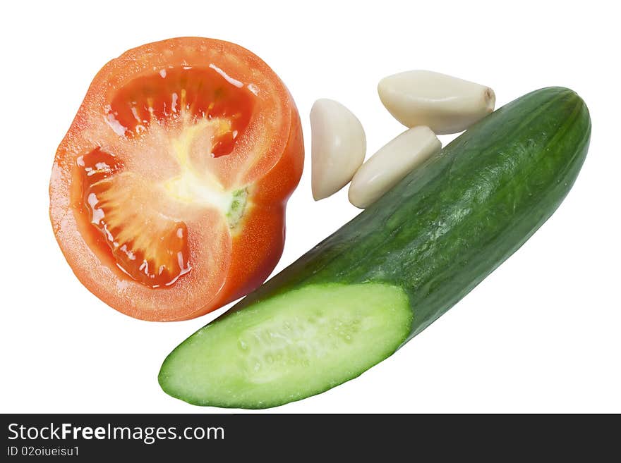 Tomato, cucumber and garlic vegetables on white background