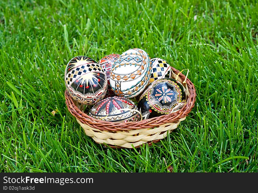 Beautifully colored easter eggs in a basket