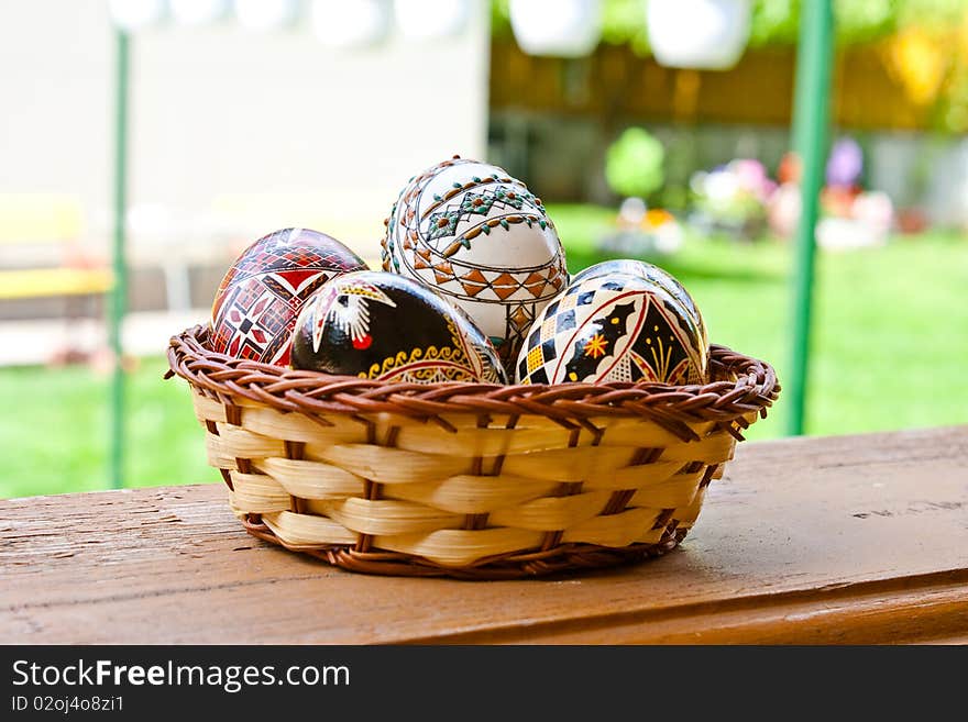 Beautifully colored easter eggs in a basket. Beautifully colored easter eggs in a basket