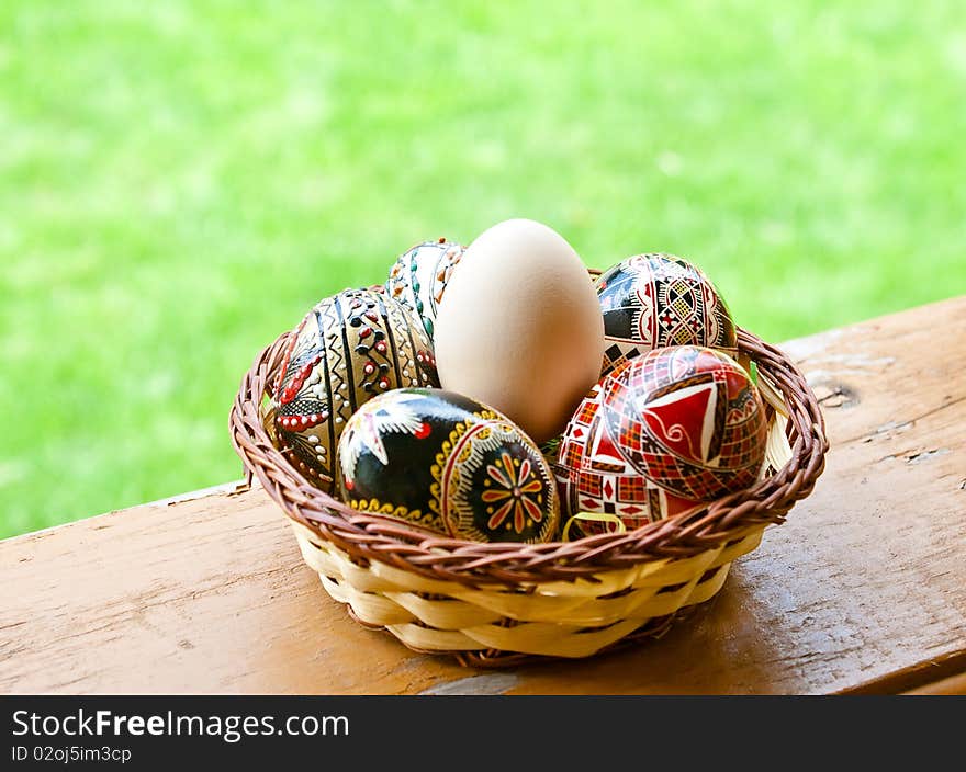 Beautifully colored easter eggs in a basket