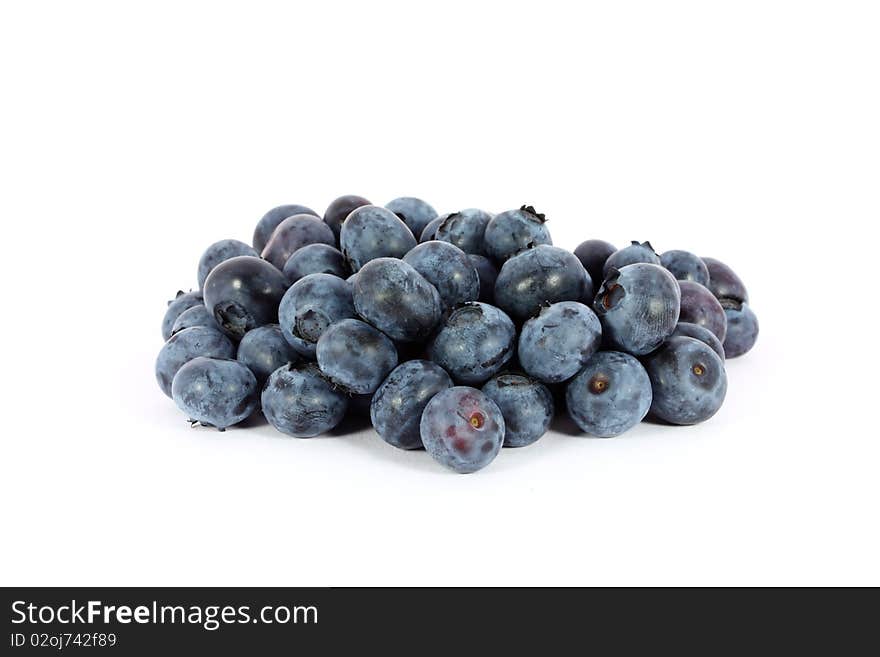 Heap of sweet juicy blueberries isolated on white