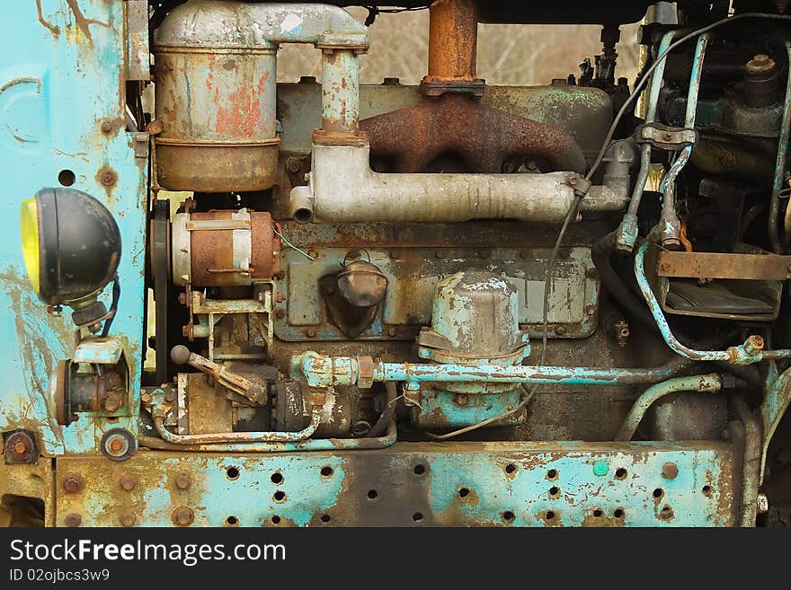 Engine of old rusty tractor. Engine of old rusty tractor