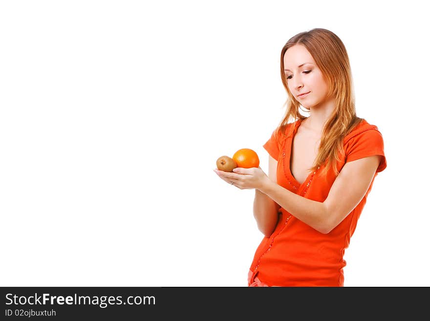 Picture of a young pretty girl in dress which holds orange and kiwi. Isolated on white. Picture of a young pretty girl in dress which holds orange and kiwi. Isolated on white.