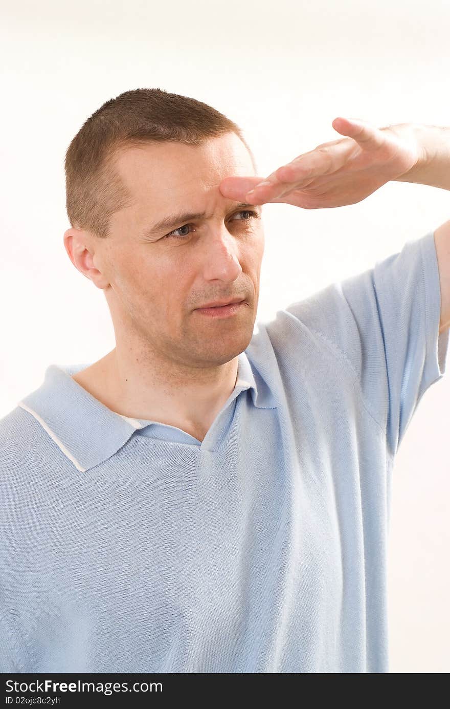 Man In A Blue Shirt Standing