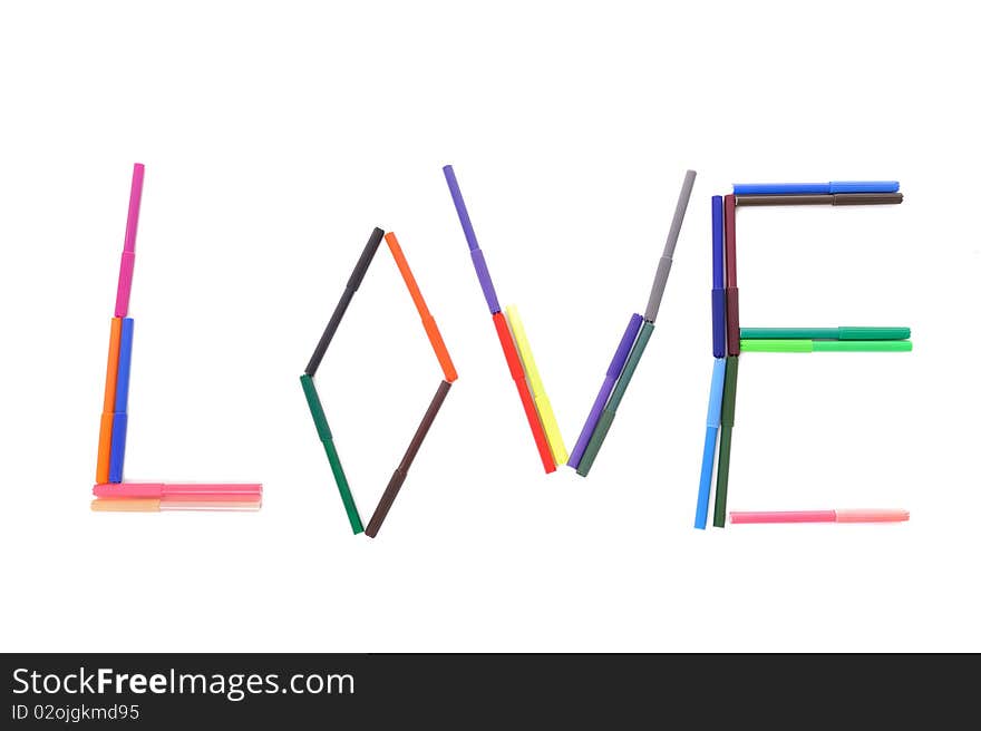 The word love arranged from tip-pen markers