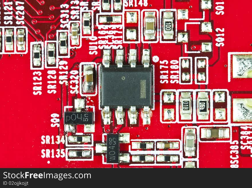 Red electronic circuit close-up