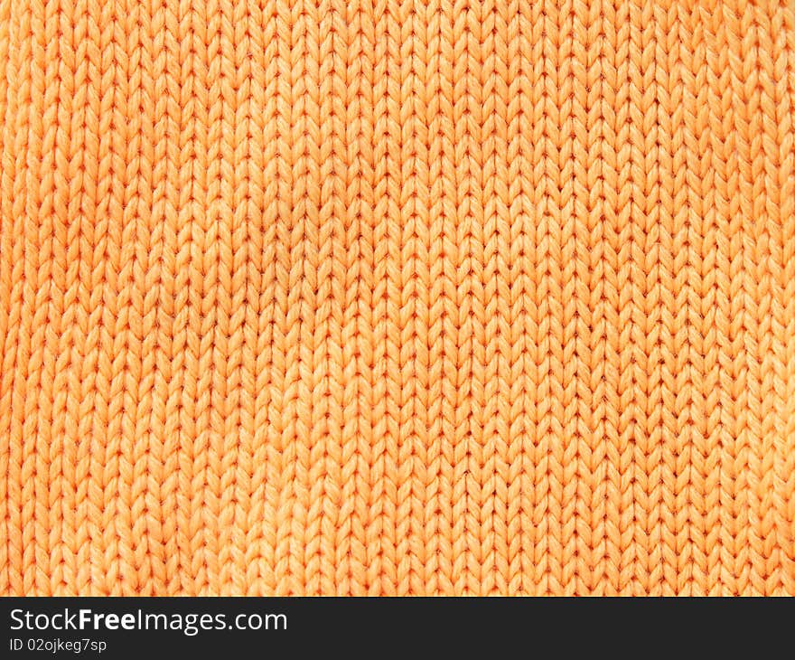 Closeup photo of the orange woolen cloth