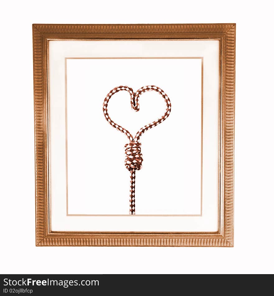 A old photoframe with heart on white