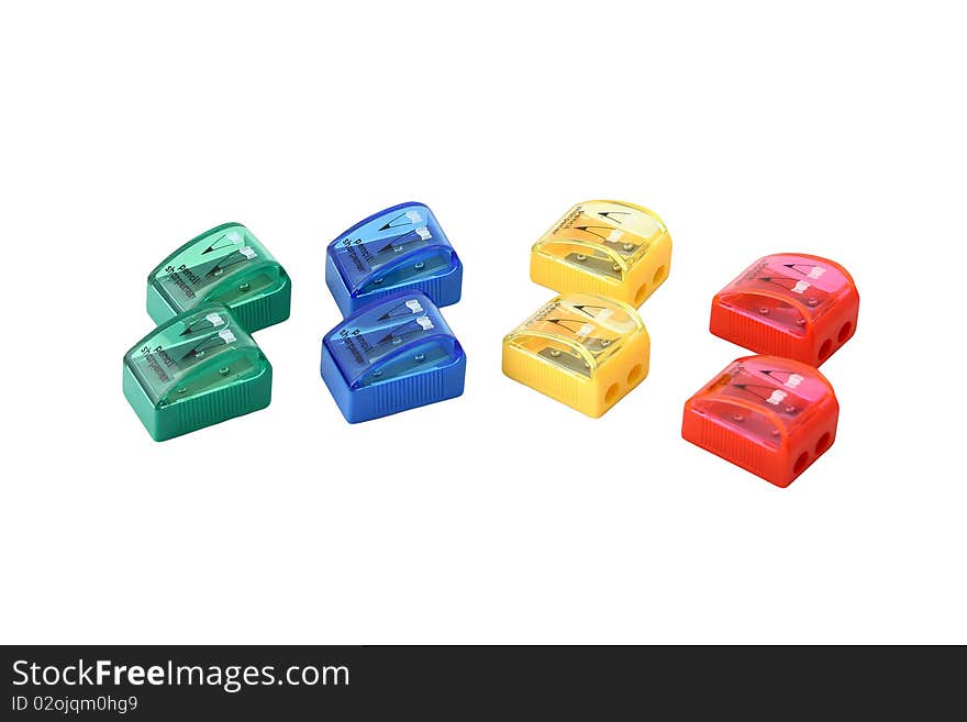 Group of pencil-sharpeners in a lot of colors isolated on white background.