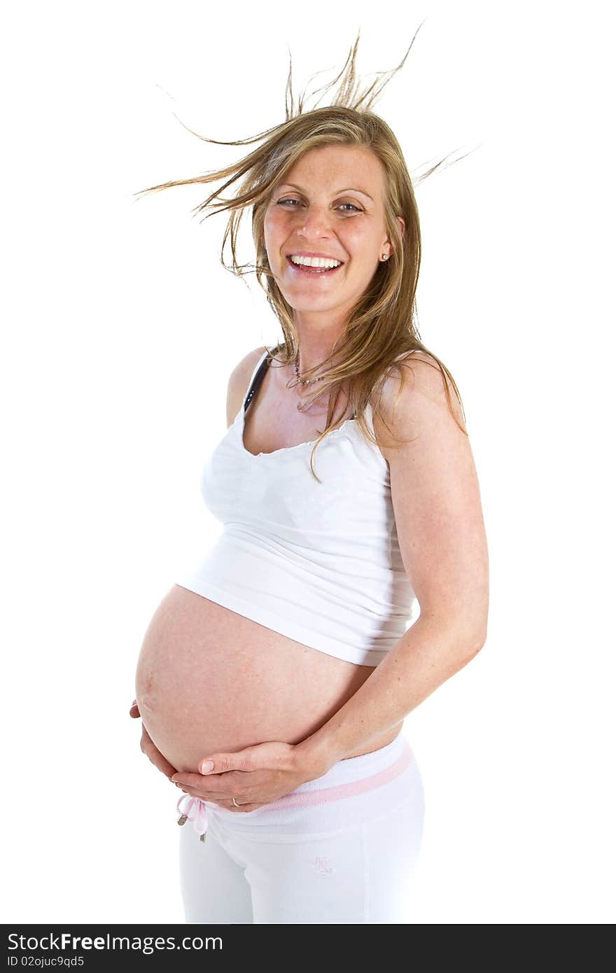 Young fresh pregnant woman isolated over white background. Young fresh pregnant woman isolated over white background.