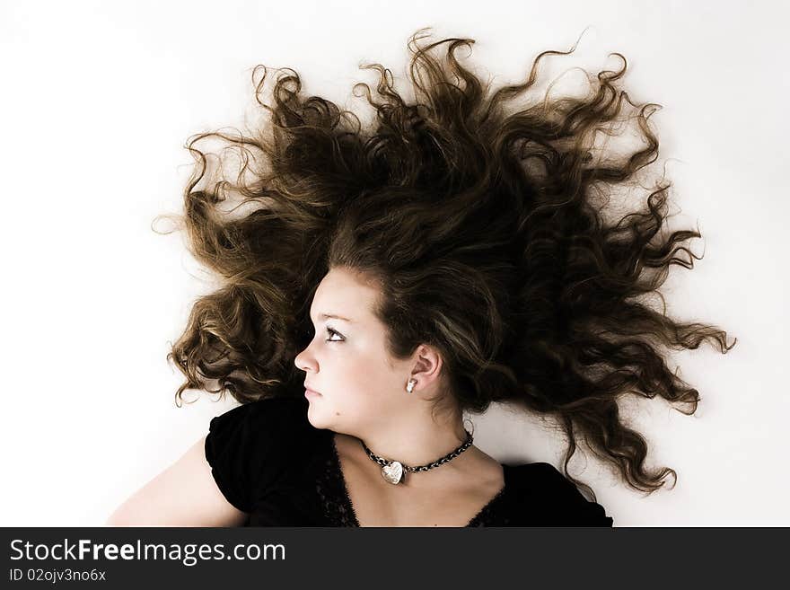 Romantic woman with spread hair