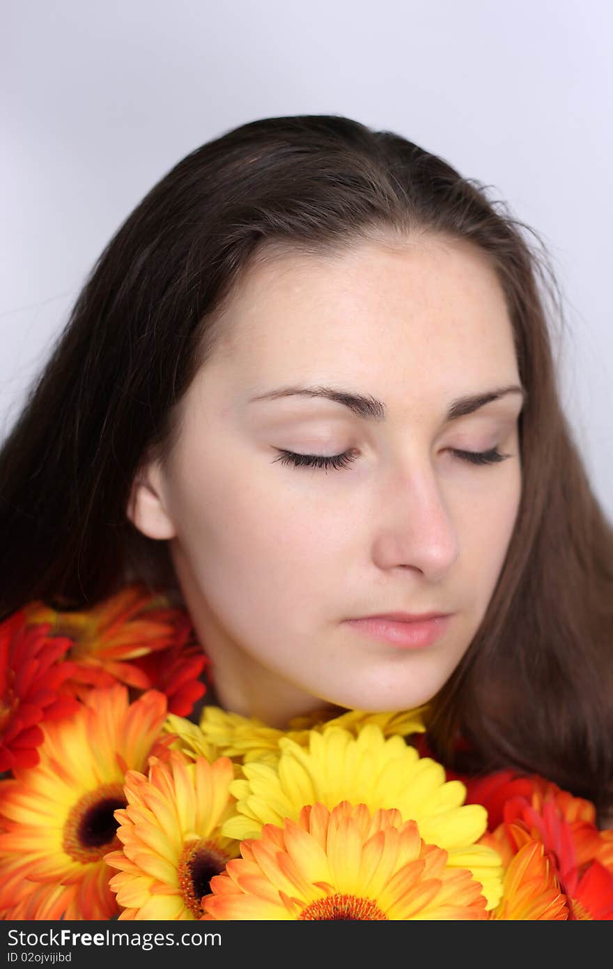 Beautiful girls with gerberas