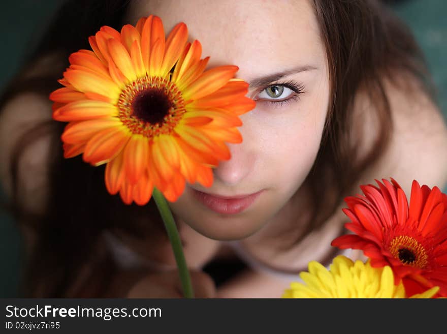 Beautiful girls with gerberas