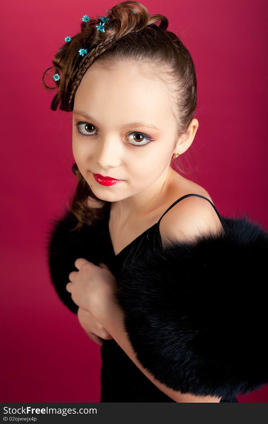 Young Girl Posing On Red Background