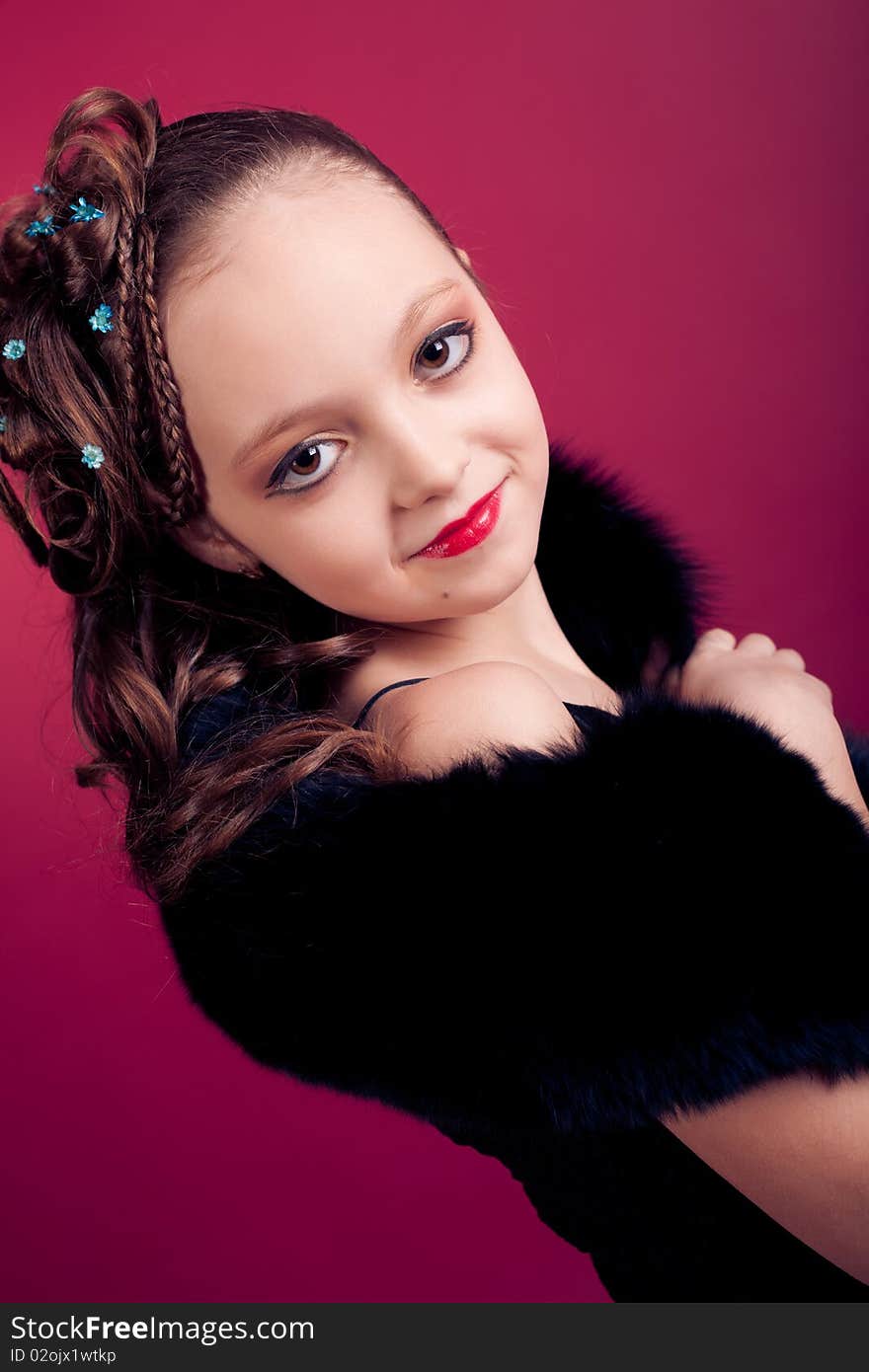 Young Girl Posing On Red Background