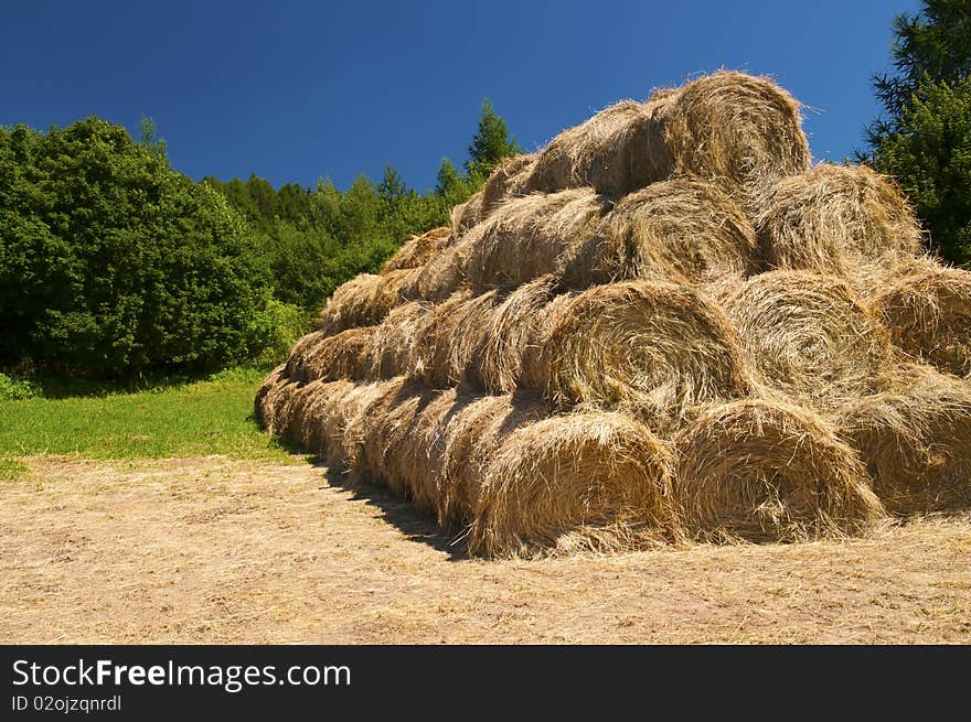 Landscape with bales of straw